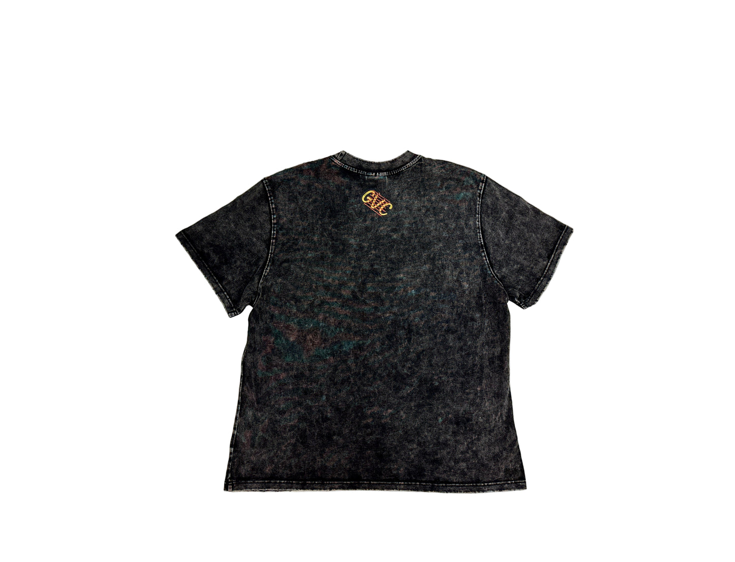 Black t-shirt with 'GUC' logo on a textured gray surface